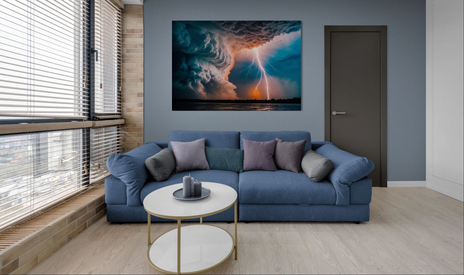 Dramatic sky lightning wall art in a modern apartment living room with blue sofa and city view windows