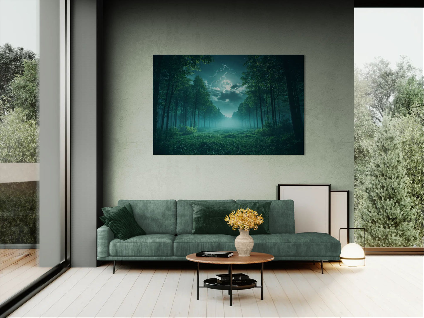 Moonlight Forest canvas wall art hanging above a green sofa in a modern living room with large window and cozy natural light.