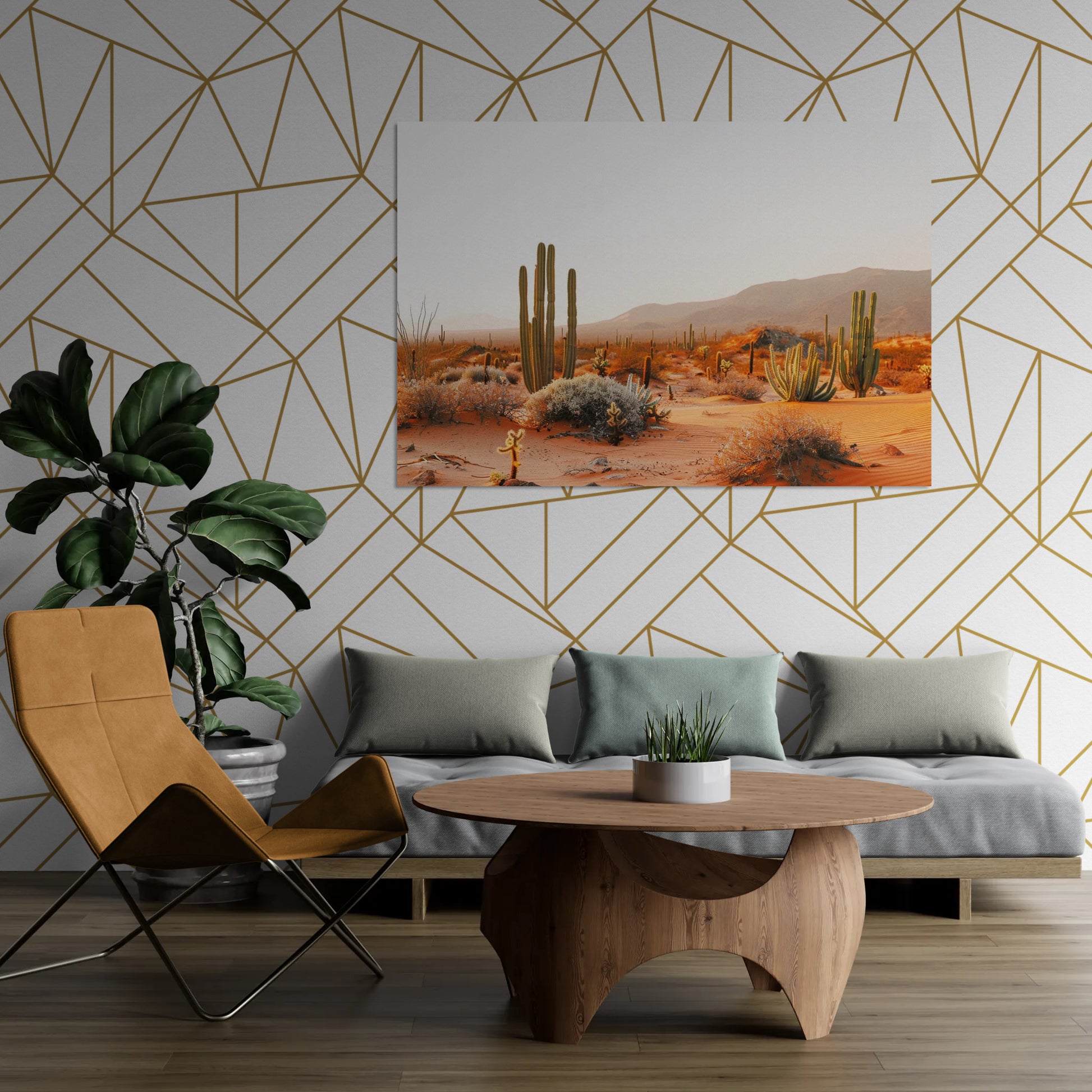 Warm tones desert cactus landscape canvas wall art hanging above a modern sofa, with mustard chair, wooden coffee table, and tropical plant decor